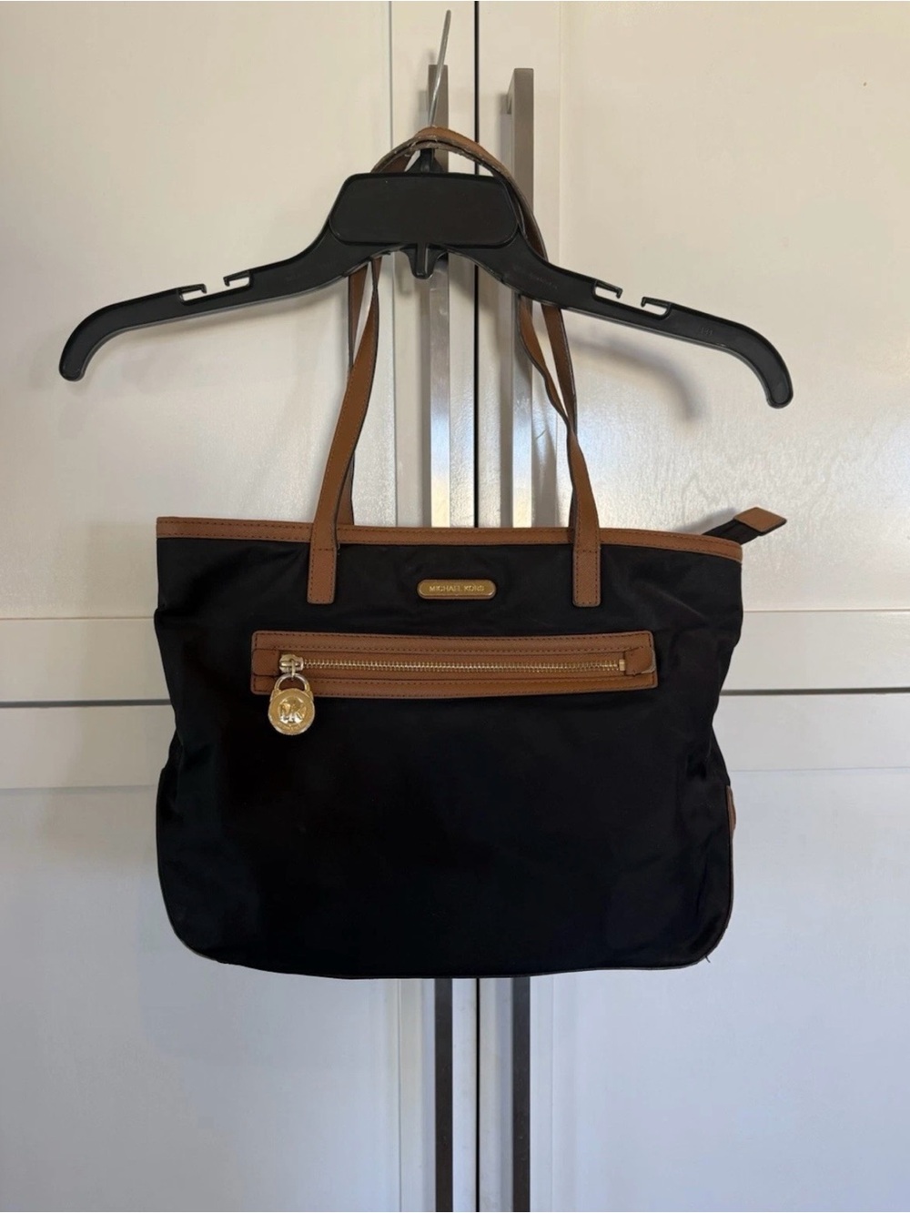 Michael Kors Black Tote with Brown Trim and Gold Hardware